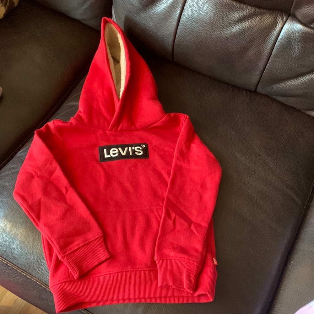 Red Levi’s hoodie